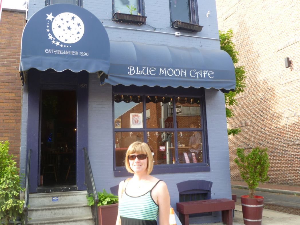 Anna in front of Blue Moon Cafe